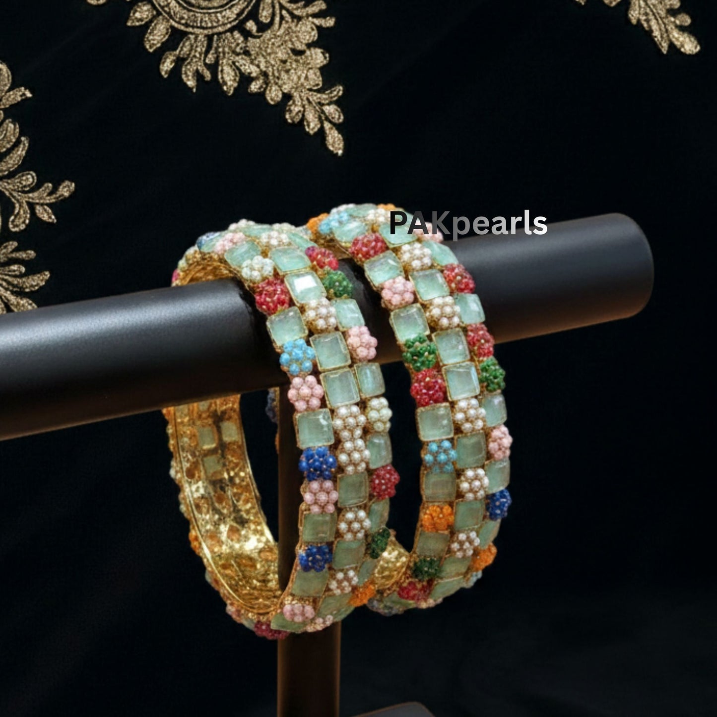 Elegant Pakistani style party wear bangles with intricate stone work suitable for weddings and festive occasions