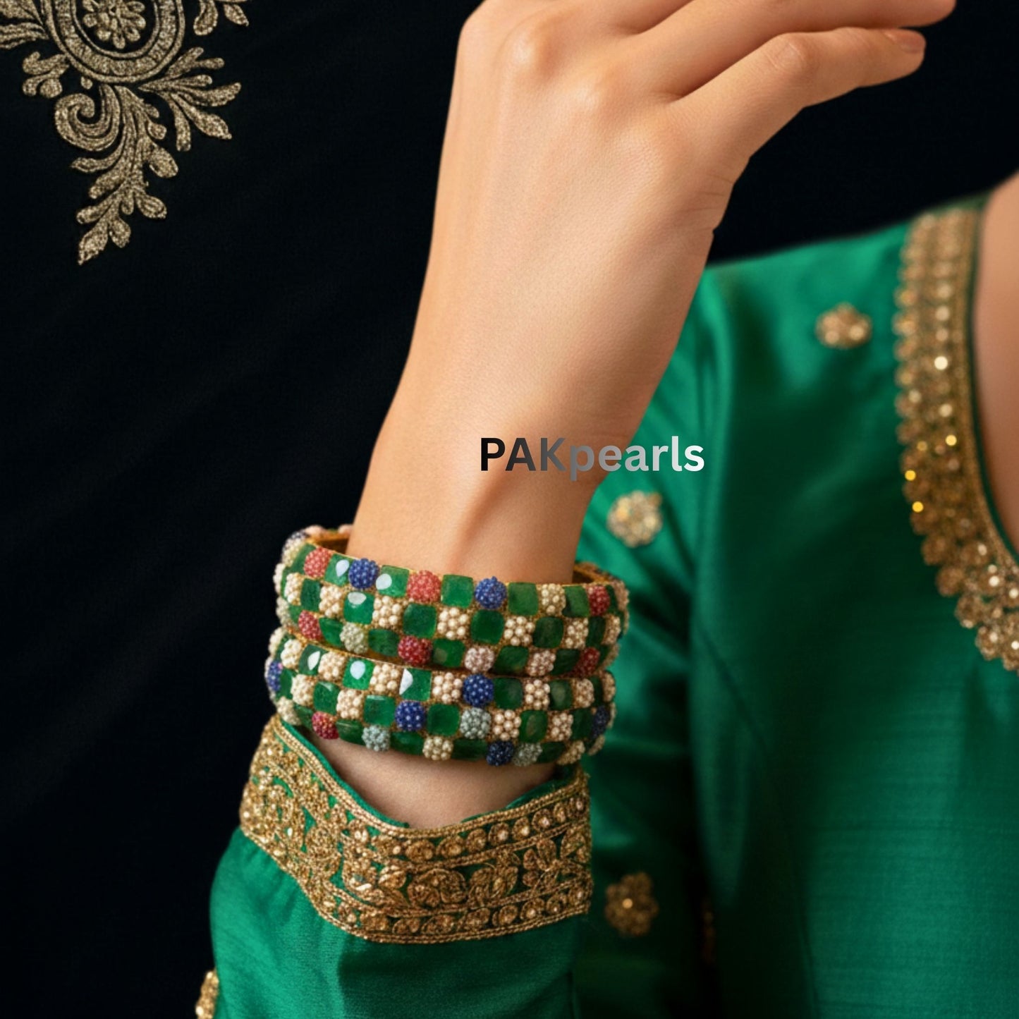 Pair of Green Mona Lisa stone bangles featuring multicolored floral bead clusters on a gold-plated base.