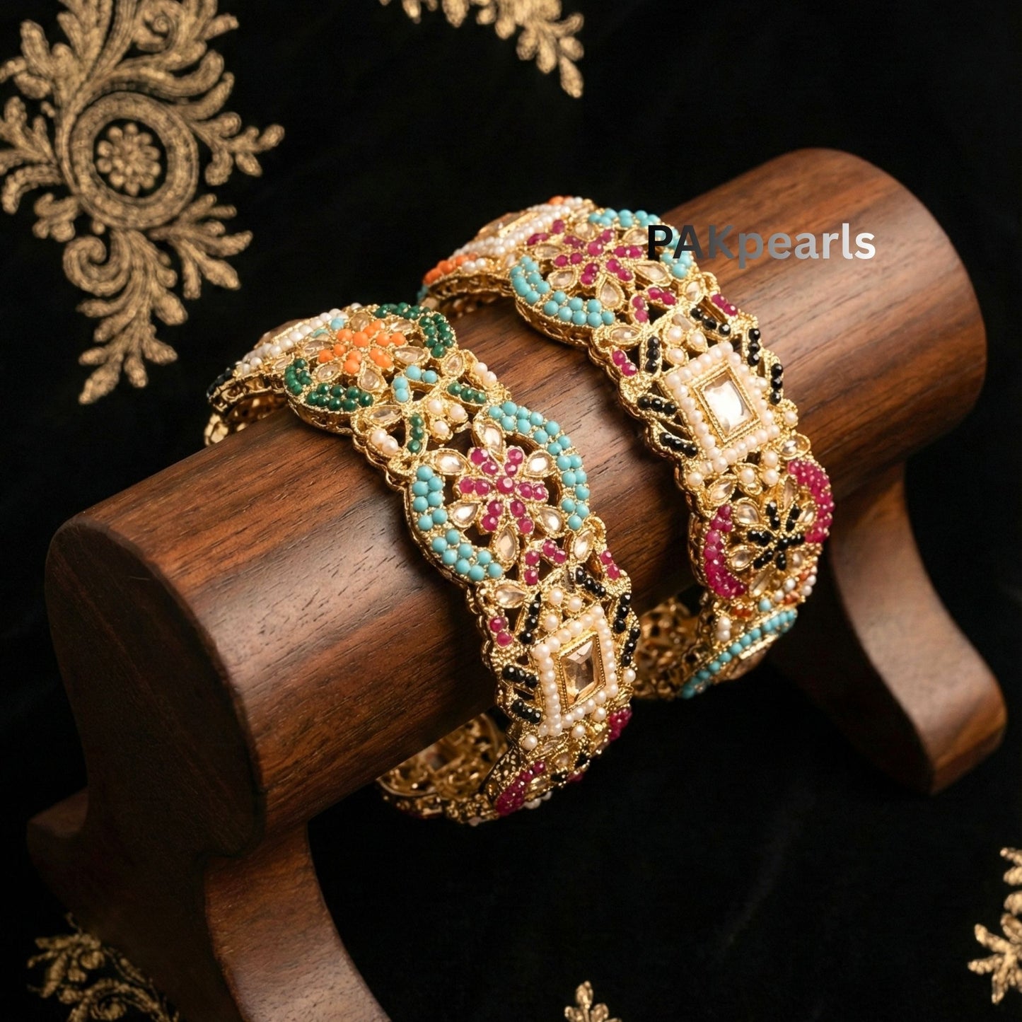 Nauratan style gold bangles with a rich arrangement of colorful gemstones and seed pearls